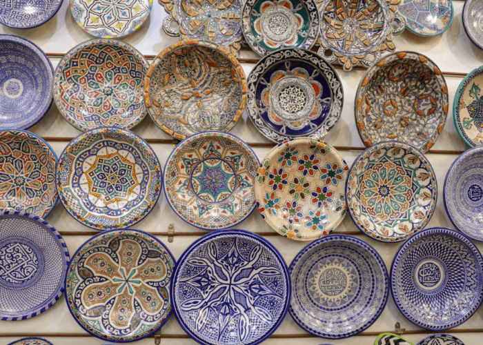 Colorful hand-painted Moroccan ceramic plates with traditional geometric patterns