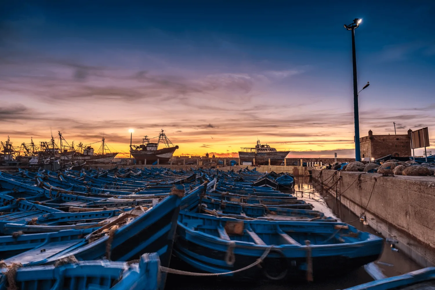 Blue fishing boats in Essaouira Morocco