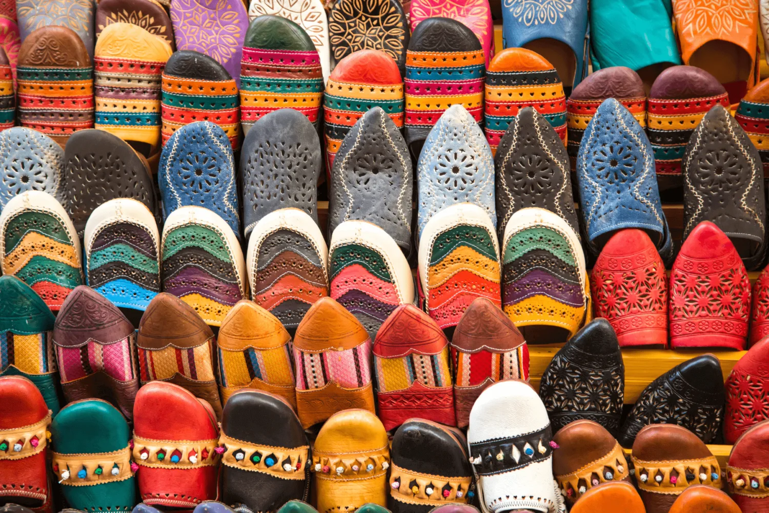 Colorful Moroccan leather slippers in a medina souk